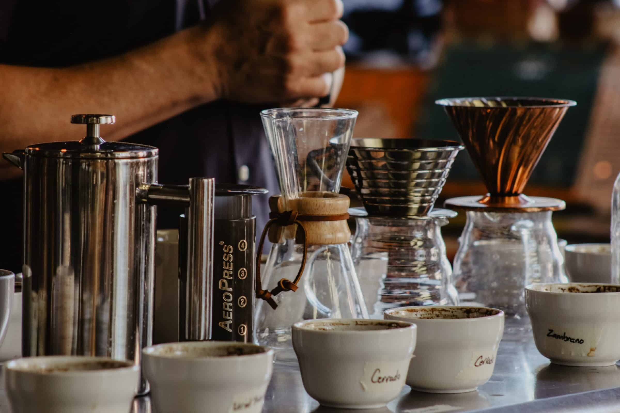 person brewing coffee